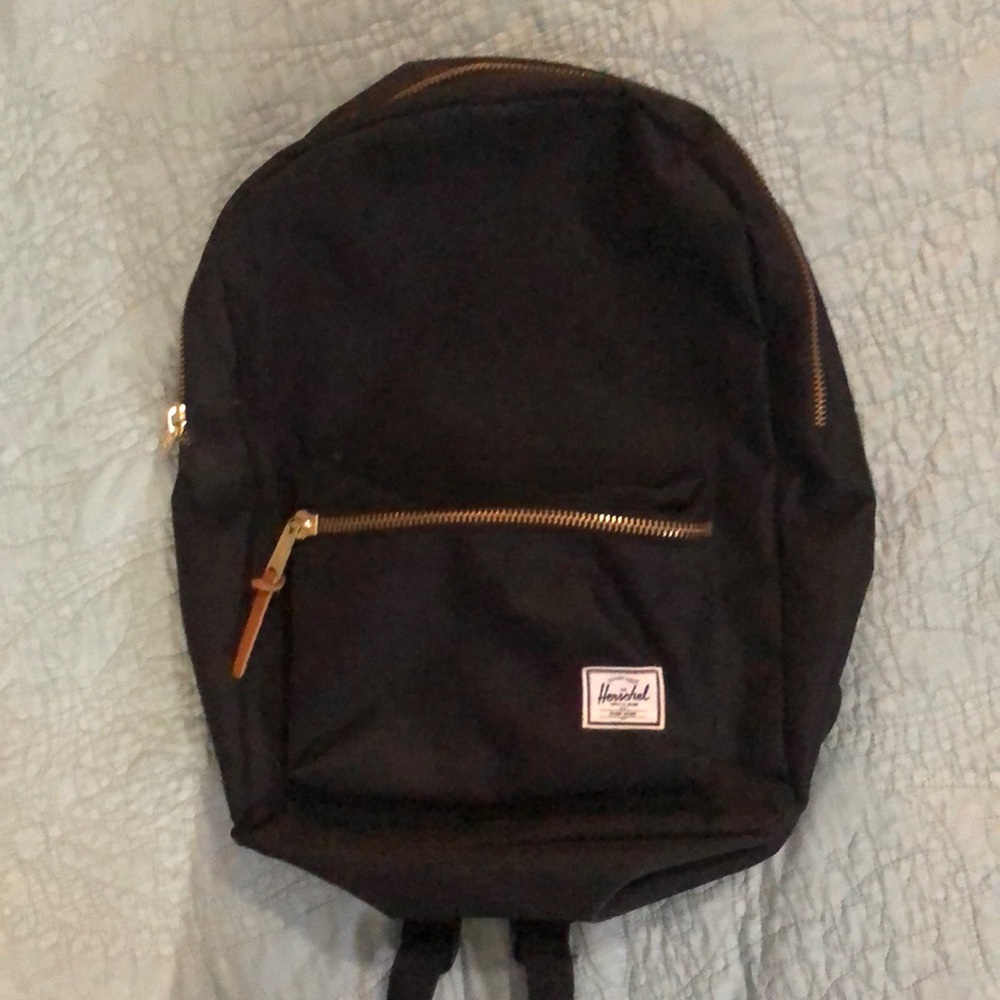 Herschel backpack with gold zippers